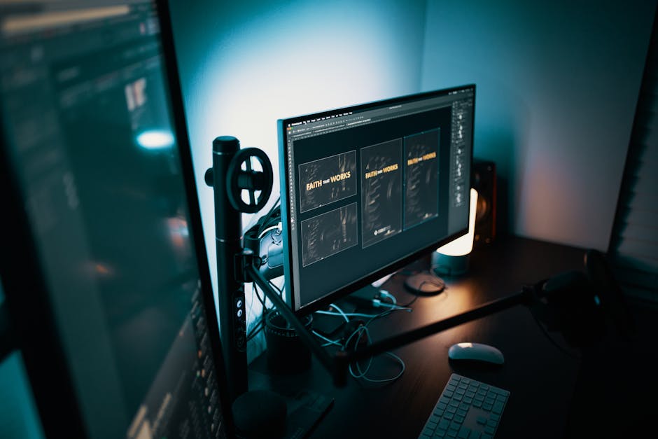 Sleek workspace featuring dual monitors in a dimly lit room, ideal for productivity and tech enthusiasts
